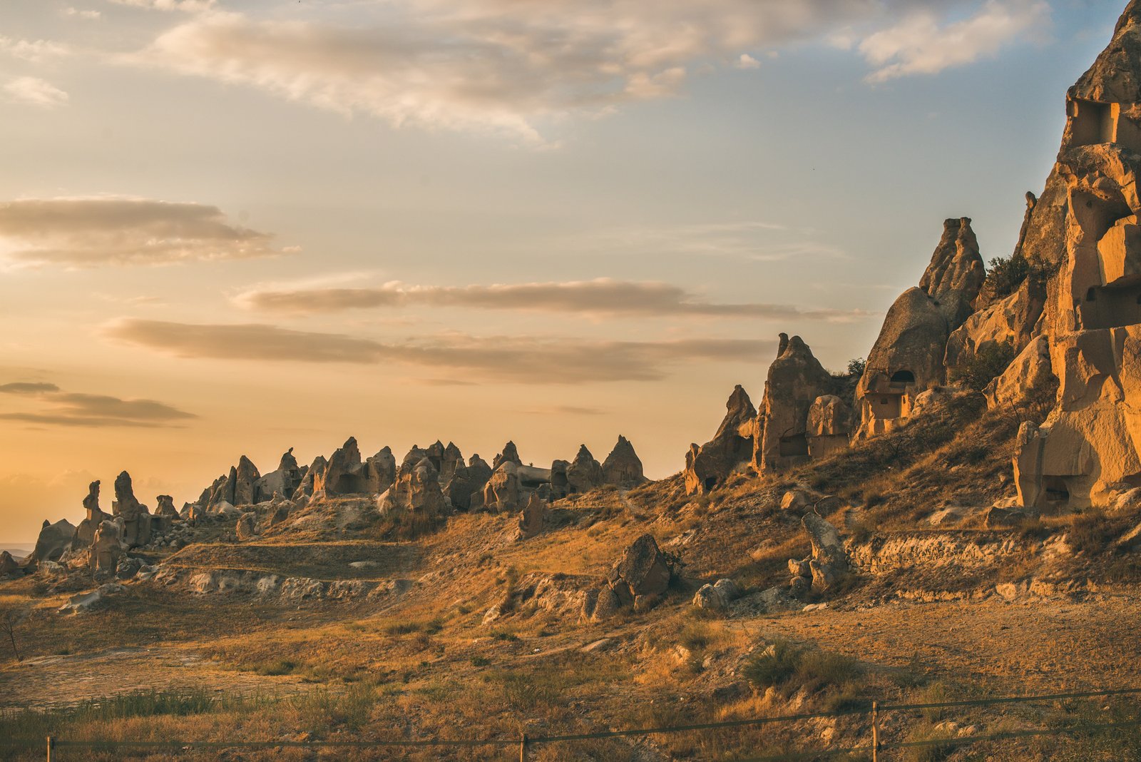 Natural volcanic rocks with ancient cave houses in Cappadocia, Turkey